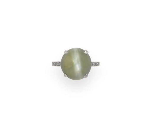 A CAT'S EYE CHRYSOBERYL AND DIAMOND RING