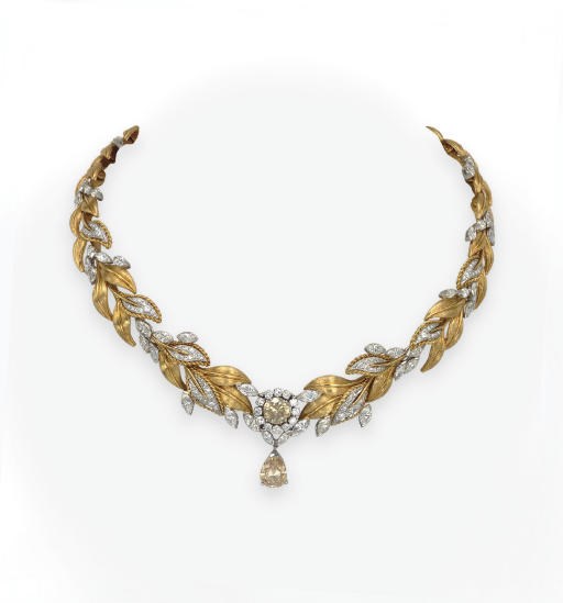 A COLORED DIAMOND AND GOLD NECKLACE
