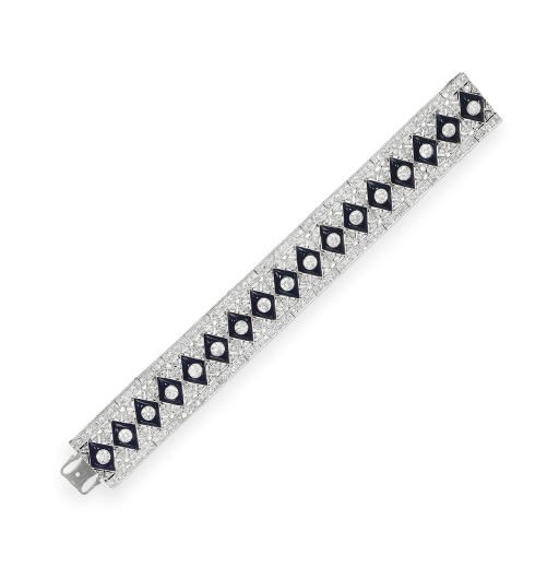AN ART DECO DIAMOND AND ONYX BRACELET, BY LACLOCHE