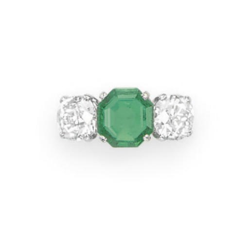 AN EMERALD AND DIAMOND RING, BY RAYMOND YARD