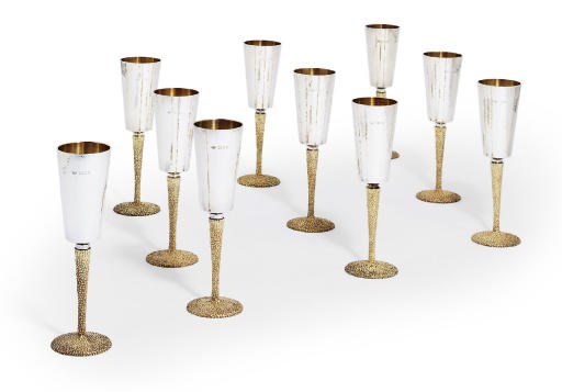 A SET OF TEN ELIZABETH II PARCEL-GILT SILVER GOBLETS