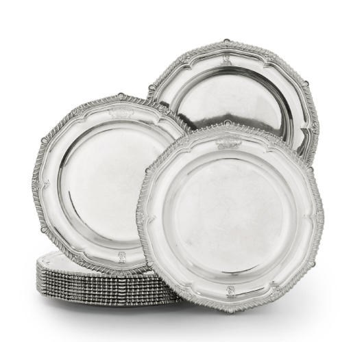 A SET OF TWELVE GEORGE III SILVER DINNER-PLATES FROM THE DINORBIN SERVICE