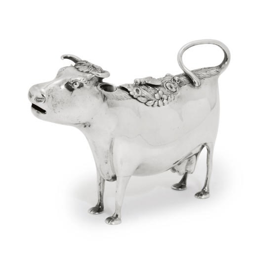 A GEORGE III SILVER COW-CREAMER