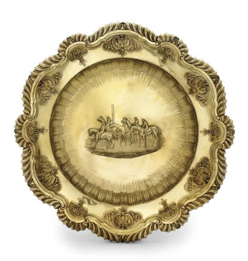 A GEORGE IV SILVER-GILT CHARGER