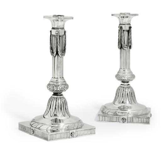 A PAIR OF DUTCH SILVER CANDLESTICKS