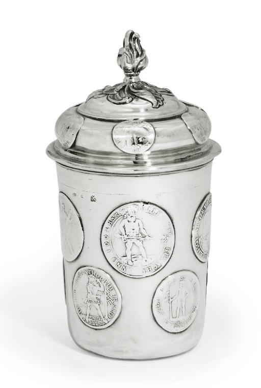 A GERMAN SILVER COIN BEAKER AND COVER