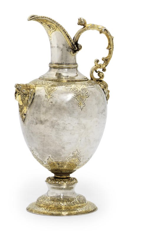 A CONTINENTAL PARCEL-GILT SILVER EWER