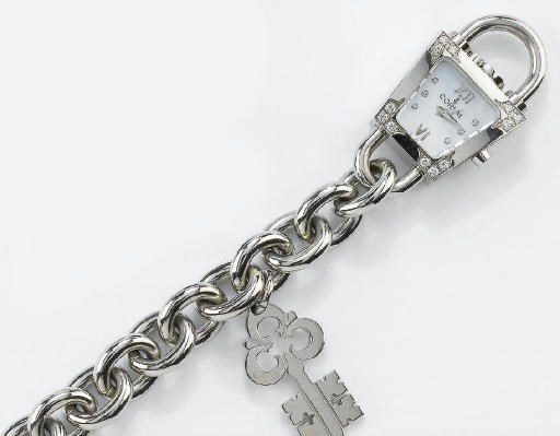 OROLOGIO IN ACCIAIO CON BRILLANTI E MADREPERLA, CORUM