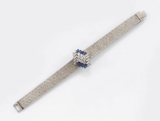 OROLOGIO A SCOMPARSA IN ORO, DIAMANTI E ZAFFIRI, PIAGET