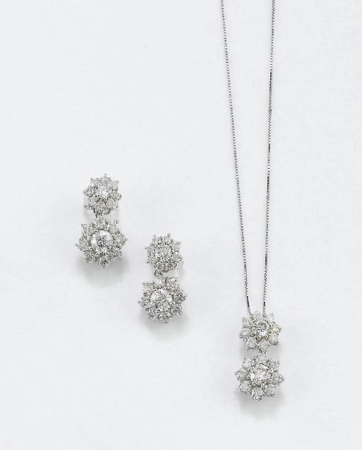 DEMI PARURE IN ORO E DIAMANTI