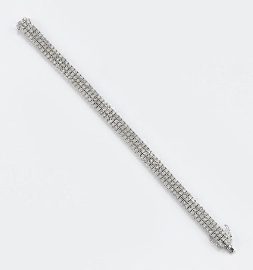 BRACCIALE A FASCIA SEMISNODATO IN ORO E DIAMANTI