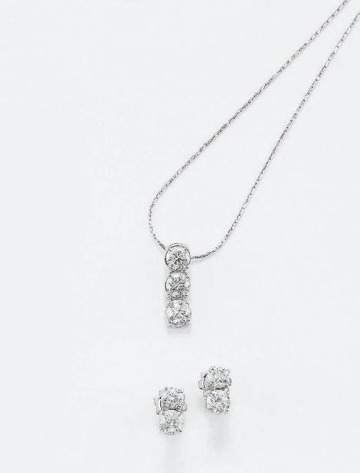 DEMI PARURE IN ORO E DIAMANTI