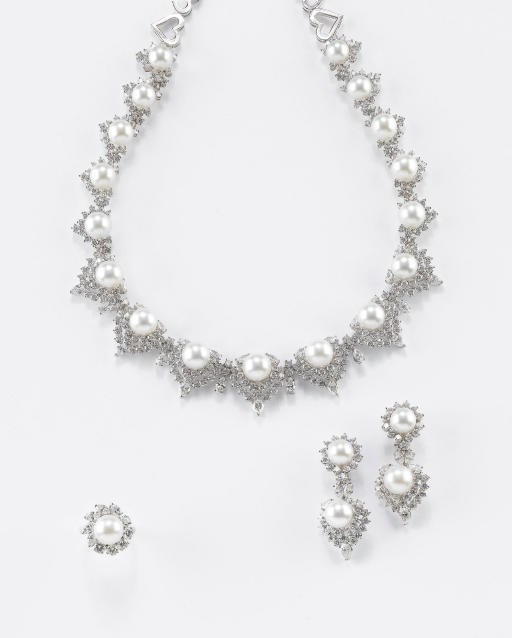 PARURE IN ORO CON PERLE AUSTRALIANE COLTIVATE E DIAMANTI