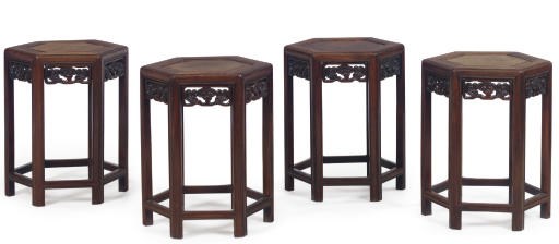 A SET OF FOUR CHINESE HARDWOOD STOOLS
