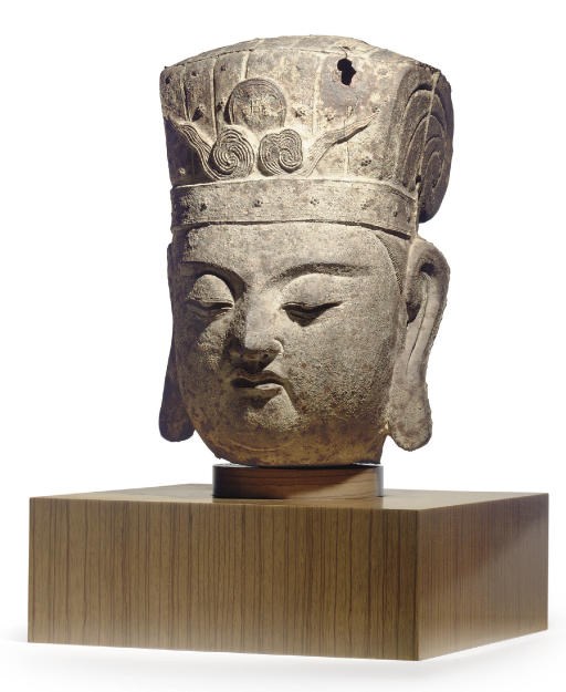 A LARGE CHINESE CAST IRON HEAD OF A DAOIST DEITY