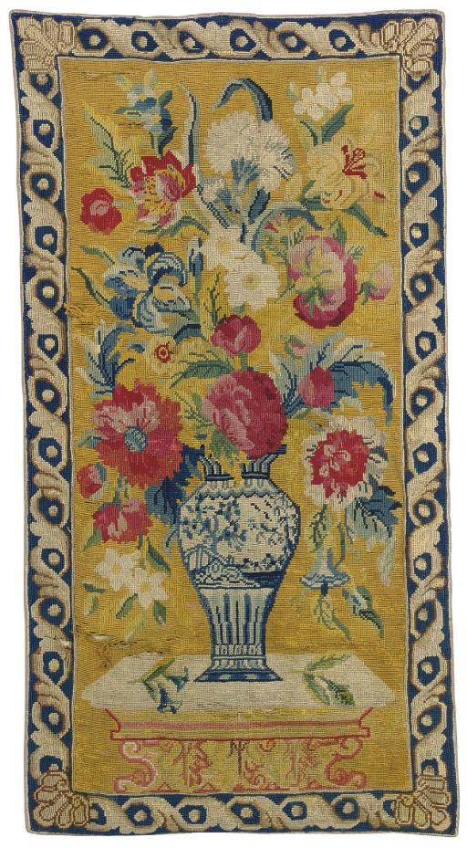 AN ENGLISH NEEDLEPOINT RUG