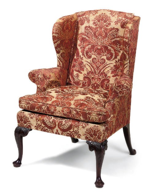 A MAHOGANY WING ARMCHAIR