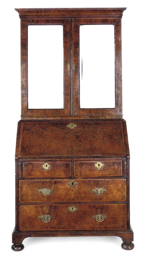A GEORGE I WALNUT AND FEATHERBANDED BUREAU CABINET