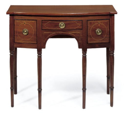 A REGENCY MAHOGANY BOWFRONT SIDEBOARD