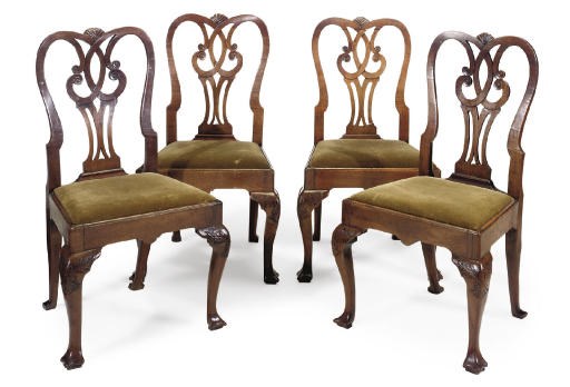 A SET OF FOUR GEORGE II WALNUT DINING CHAIRS