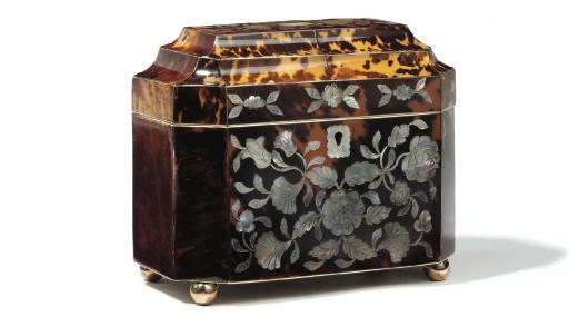 A LATE REGENCY TORTOISESHELL VENEERED TEA CADDY