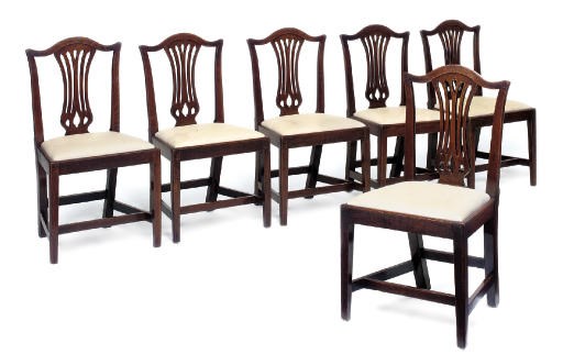 A SET OF SIX GEORGE III OAK DINING CHAIRS