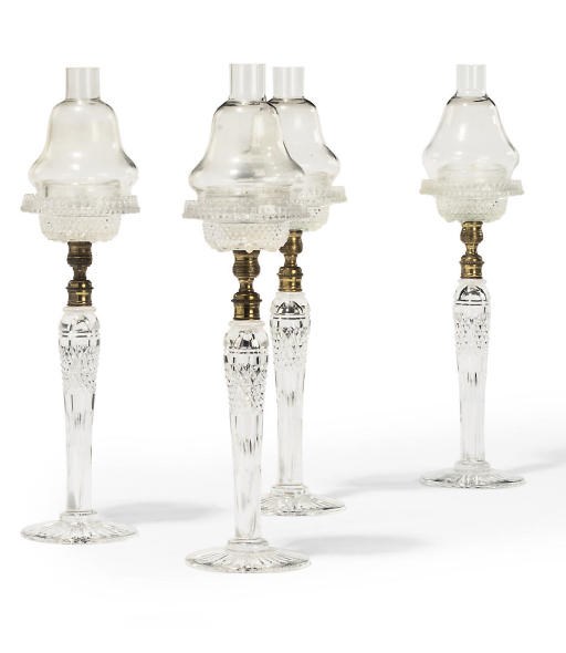A SET OF FOUR GLASS CLARKES PATENT 'CRICKLITES'