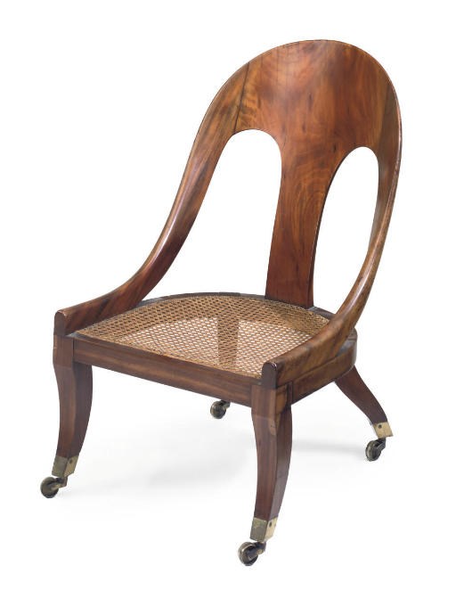 A REGENCY GONCALO ALVEZ AND CANED CHAIR