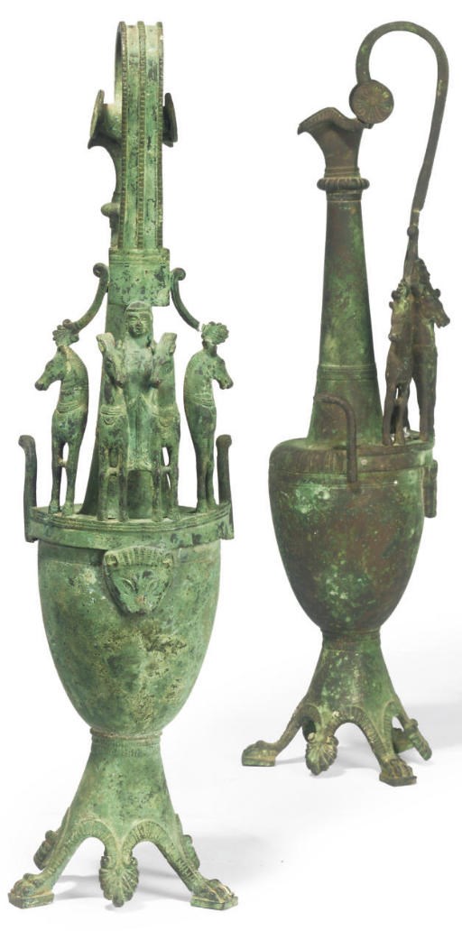 A PAIR OF NEAPOLITAN BRONZE EWERS