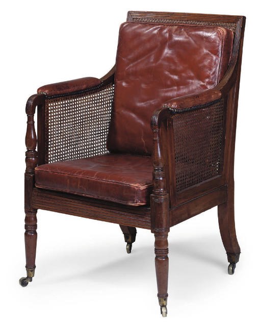 A LATE REGENCY MAHOGANY AND CANED BERGERE