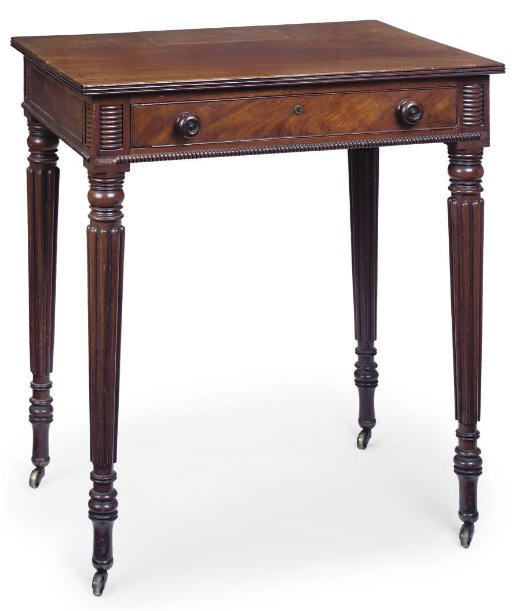 A REGENCY MAHOGANY CHAMBER WRITING TABLE