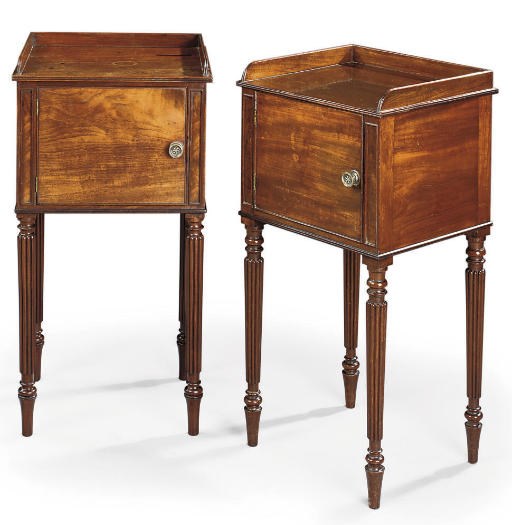 A MATCHED PAIR OF REGENCY MAHOGANY BEDSIDE CUPBOARDS