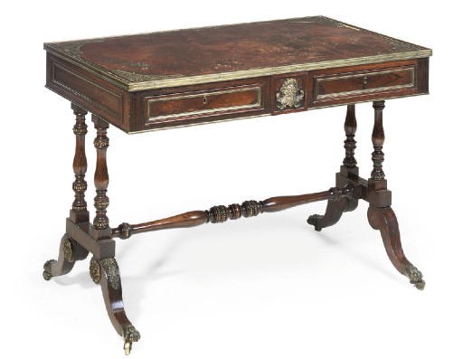 A GEORGE IV BRASS MOUNTED AND INLAID ROSEWOOD WRITING TABLE