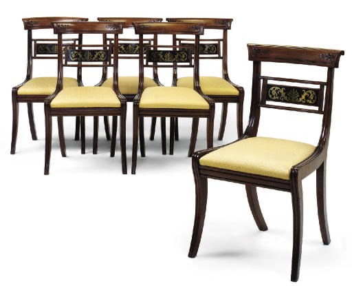A SET OF SIX REGENCY MAHOGANY EBONY AND BRASS INLAID DINING CHAIRS