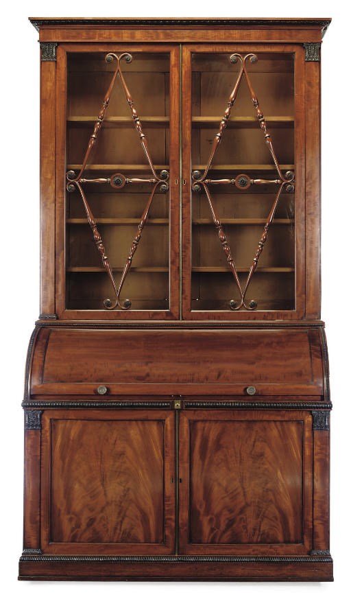 A LATE REGENCY MAHOGANY CYLINDER BUREAU BOOKCASE