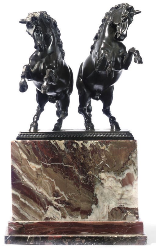 A GERMAN BRONZE GROUP OF TWO REARING HORSES