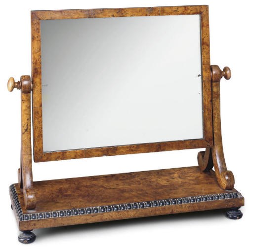 A REGENCY BURR ELM AND EBONISED DRESING MIRROR