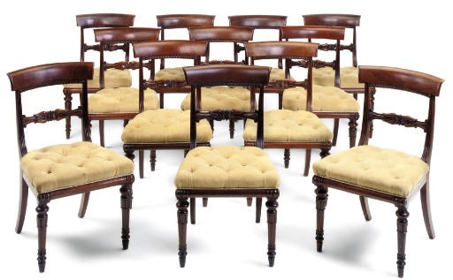 A SET OF TWELVE WILLIAM IV MAHOGANY DINING CHAIRS