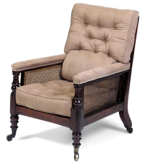 A WILLIAM IV MAHOGANY AND CANED LIBRARY BERGERE