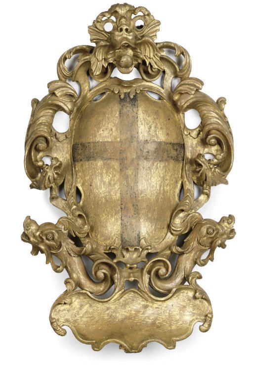 AN ITALIAN GILTWOOD CARTOUCHE