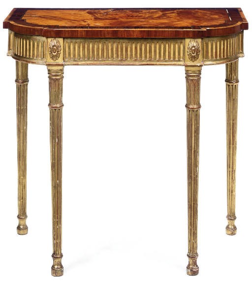 A GEORGE III SATINWOOD AND GILTWOOD SIDE TABLE