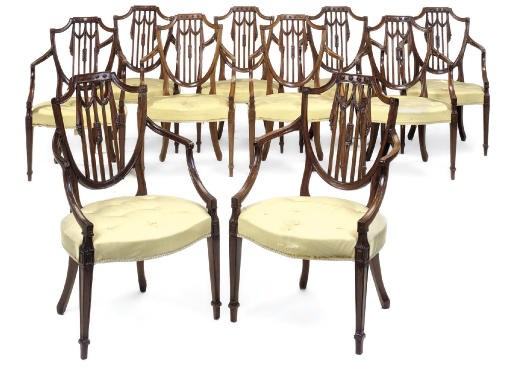 A SET OF TEN MAHOGANY ARMCHAIRS