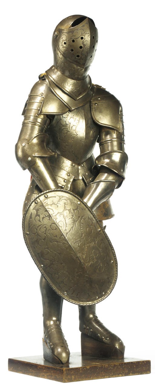 AN ETCHED STEEL MODEL OF A SUIT OF ARMOUR
