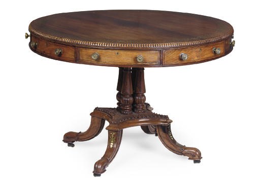 AN ANGLO INDIAN ROSEWOOD DRUM TABLE