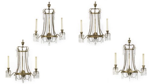 A SET OF FOUR GILT-BRONZE WALL LIGHTS
