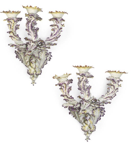 A PAIR OF GERMAN PORCELAIN THREE-LIGHT WALL APPLIQUES