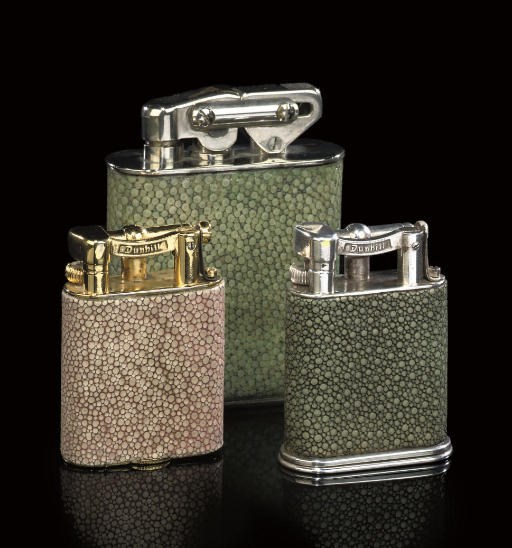 A GROUP OF THREE SHAGREEN VENEERED TABLE LIGHTERS