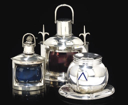 A SILVER TABLE LIGHTER IN THE FORM OF A PORT-SIDE MARINE LAMP