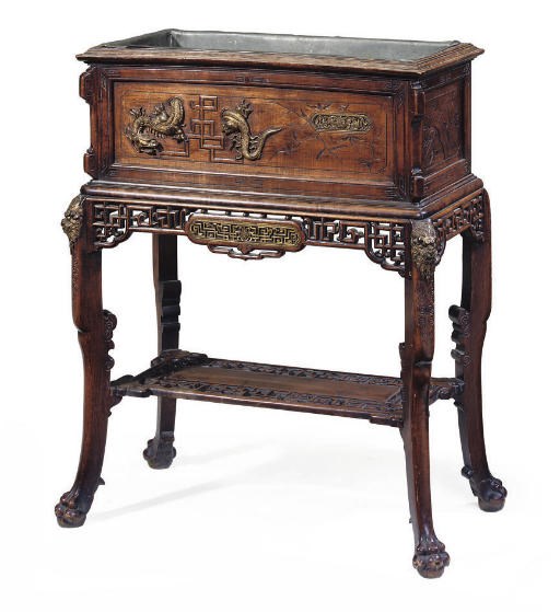 A NAPOLEON III GILT BRONZE MOUNTED BEECH JARDINIERE