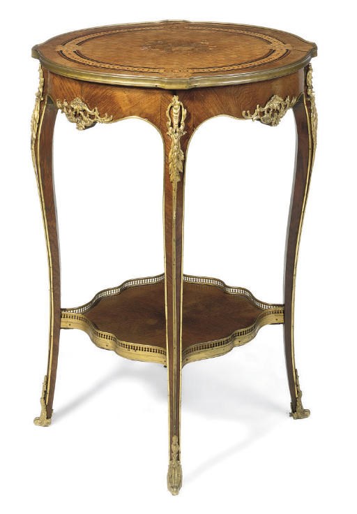 A NAPOLEON III GILT-METAL MOUNTED KINGWOOD PARQUETRY AND MARQUETRY GUERIDON